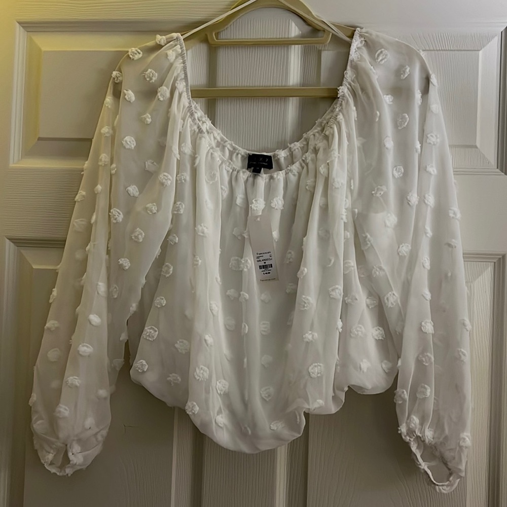 Francesca’s white cropped shirt